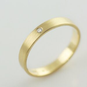 18k recycled gold ring with white diamond made in portland
