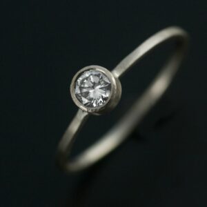 quarter carat diamond in white gold engagement ring handmade