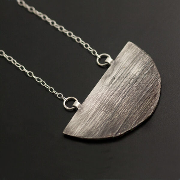 silver necklace with texture